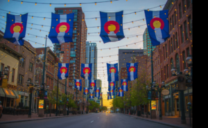 Colorado flags and lights on city street