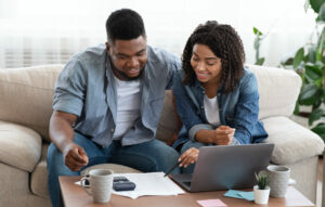 couple going over finances planning for a move