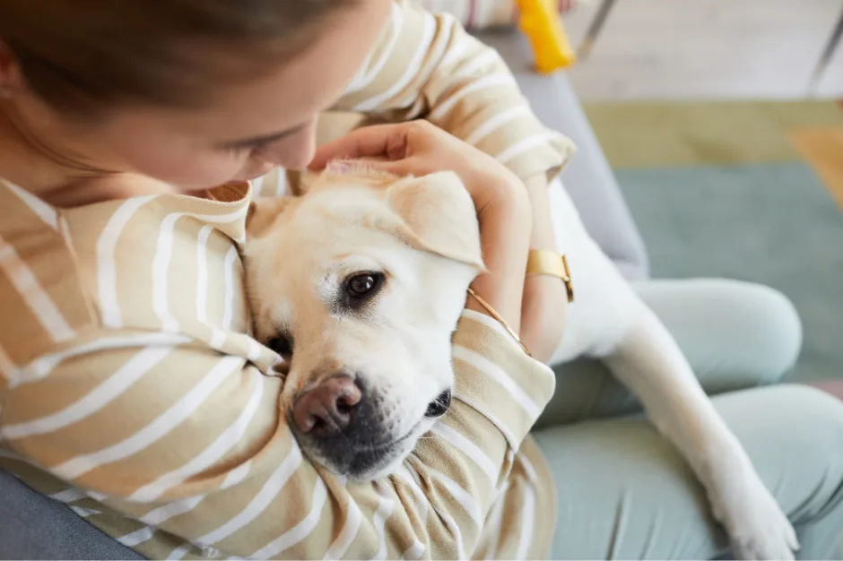 woman hugging dog in a top pet friendly apartment in Atlanta 