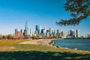 View of Lower Manhattan’s skyline from across the Hudson River, commonly used when discussing cities near New York City.