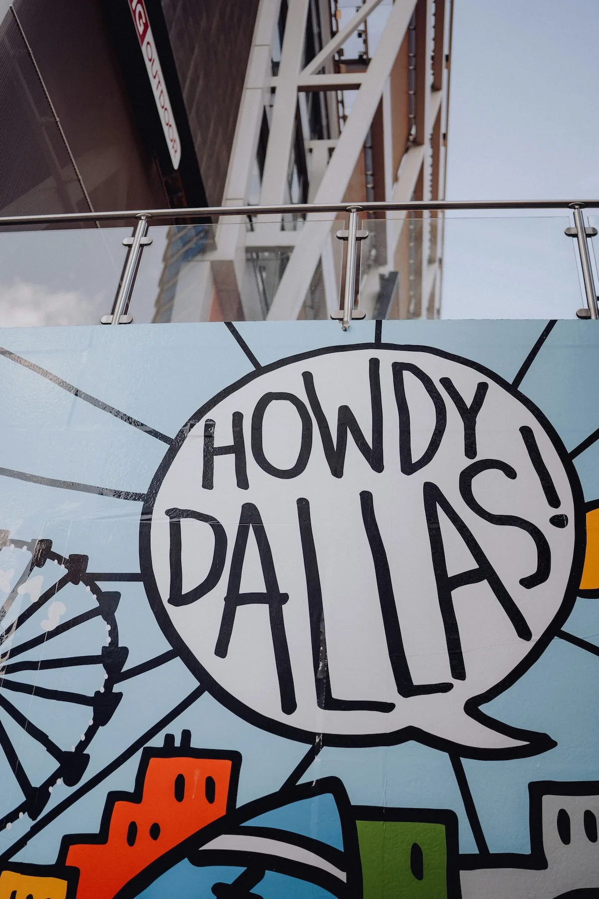 urban art saying "howdy Dallas!" for an article about the cheapest neighborhoods in Dallas