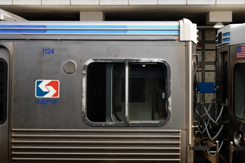 SEPTA Regional Rail train at Philadelphia station connecting suburban cities like Lansdowne, Sharon Hill, Jenkintown, Ardmore, and Narberth to Center City